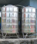 two stainless steel water tanks