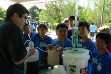 Devin Takara demonstrating bioenergy