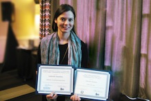 Gabrielle Sanehira with two awards