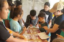 4-H students do meat-identification exercise