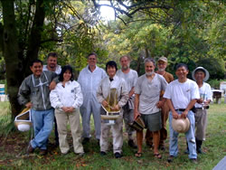 (left to right) CTAHR Honeybee Project members Scott Nikaido, Mark Wright, Ethel Villalobos, and Tyler Ito (fifth from left) pose with collaborating beekeepers. Pictured fourth from the left is David VanderDussen, CEO of NOD Apiary Ltd. products and creator of MAQS. (Photo provided by Ethel Villalobos)