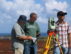 CTAHR Watershed Hydrology researchers Farhat Abbas, Ali Fares, and Amjad Ahmad survey and georeference the landscape, the first step in designing a PRB system at the Pioneer Hybrid, Waialua site. Below, researchers collect runoff samples resulting from a simulated rainfall. (Photos provided by Ali Fares).