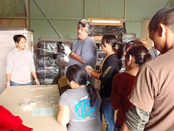 Mealani breeding team leader Mike DuPonte teaching an artificial insemination class to CTAHR Pre-Veterinary Program students.